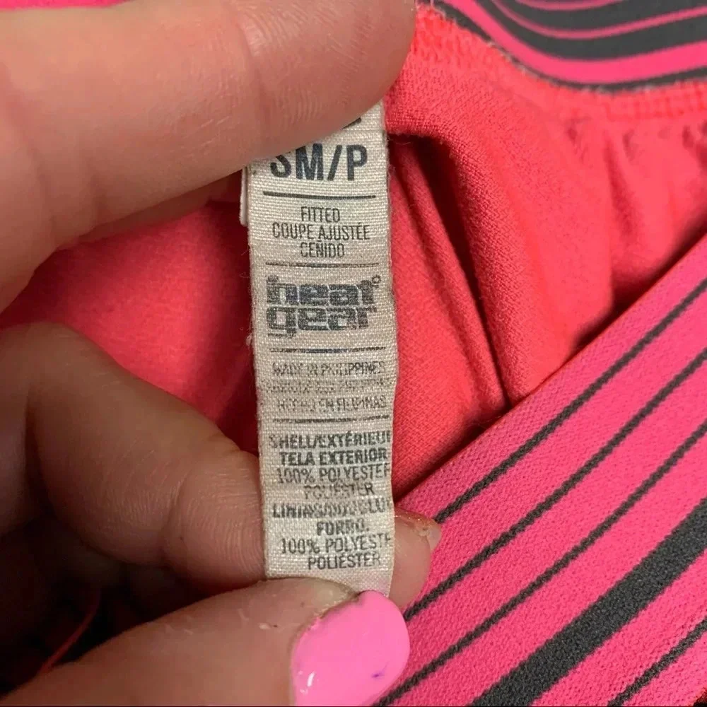 Under Armour pink running shorts size S heat gear